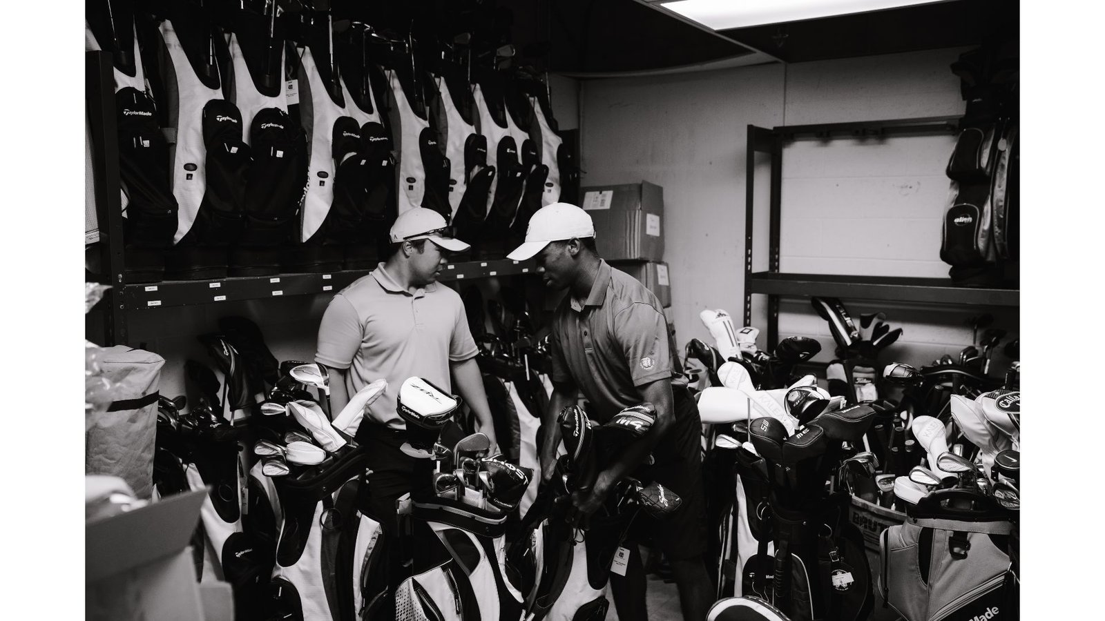 Golfer being professionally fitted for new golf clubs at a fitting studio